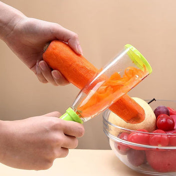 Multifunctional kitchen peeler with its built-in container, showcasing collected peels.