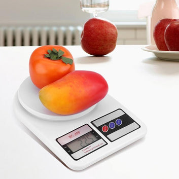 Digital kitchen food scale with a stainless steel platform for precise measurements.